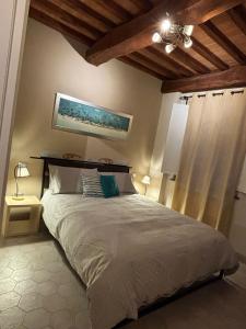 Postel nebo postele na pokoji v ubytování Superhost Lucca Casa Galli 77 Two Bedrooms Two Bathrooms + 13 fotografií