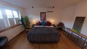 Postel nebo postele na pokoji v ubytování Erftstege#4