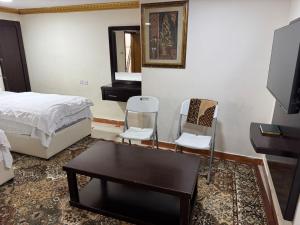 Llit o llits en una habitació de الملز