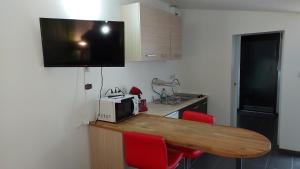 Køkken eller tekøkken på Le bon coin jardin acces autonomie parking privé