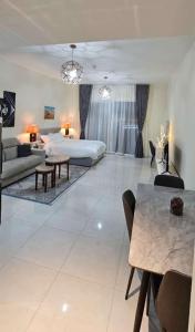 Postel nebo postele na pokoji v ubytování Luxury Studio Apartment By DownTown