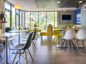 Et opholdsområde på Ibis Budget Archamps Porte de Genève