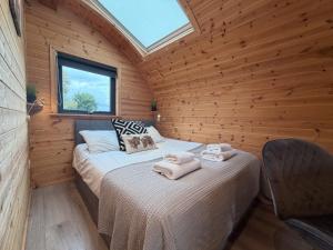 Postel nebo postele na pokoji v ubytování The Firs Country Park