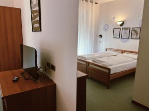 Postel nebo postele na pokoji v ubytování Hotel Varone Alberello