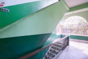 Ένα ή περισσότερα κρεβάτια σε δωμάτιο στο Hotel O by OYO New Heaven