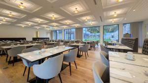 En restaurant eller et andet spisested på Oca Grande Hotel Do Pezo