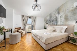 En eller flere senge i et værelse på Villa Marija Medulin by Villsy + 39 billeder