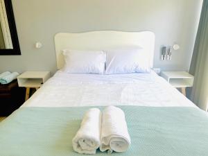 Postel nebo postele na pokoji v ubytování Mini Refugios Lodge + 3 fotografie