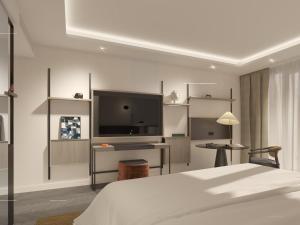 Et tv og/eller underholdning på Kennedy 89 Unbound Collection Hyatt