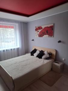 Postel nebo postele na pokoji v ubytování Trumpalaikė nuoma