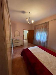 En eller flere senge i et værelse på Luxury villas