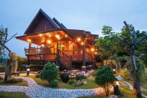 Zahrada ubytování Tum Baan Suan ตุ่มบ้านสวน