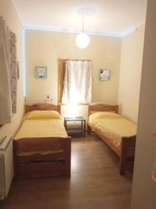 Postel nebo postele na pokoji v ubytování Hermosa casa con patio a una cuadra del lago + 16 fotografií