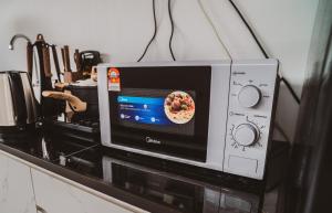 Køkken eller tekøkken på Le Gallery Perling by Cactus Homestay