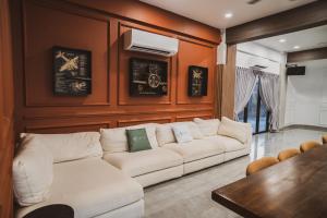 Et opholdsområde på Le Gallery Perling by Cactus Homestay