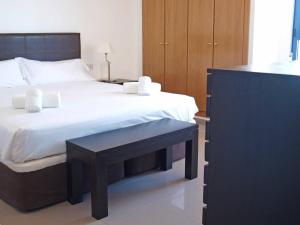 Posteľ alebo postele v izbe v ubytovaní ApartUP Patacona Panoramic + 37 fotografií