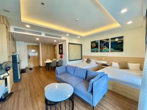 Et tv og/eller underholdning på FLC Sea Tower Quy Nhơn- The Beach