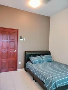 Billede fra billedgalleriet på Woon homestay 2 i Balik Pulau