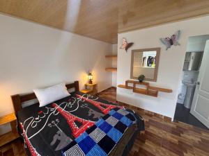 Postel nebo postele na pokoji v ubytování Hotel y Club Pueblito Quindiano Montenegro + 38 fotografií