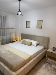 Ένα ή περισσότερα κρεβάτια σε δωμάτιο στο Urban Nest