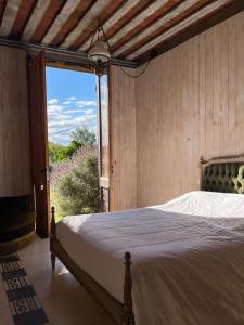 En eller flere senge i et værelse på El Granero Apart hotel