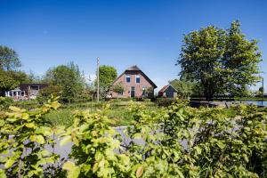 En have udenfor Boutique vakantiehuis Het Stalhuys