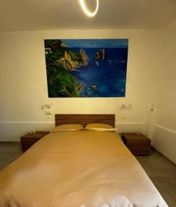 En eller flere senge i et værelse på Pompei Comfort Room