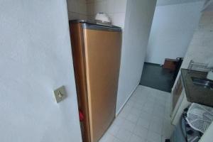 Køkken eller tekøkken på Acomodação Tranquila + 3 billeder