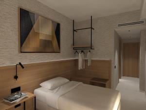 Giường trong phòng chung tại Il Leon D'Oro Hotel Bari