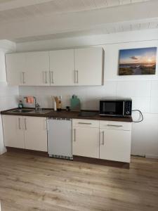 Η κουζίνα ή μικρή κουζίνα στο Ferienwohnungen am Markt