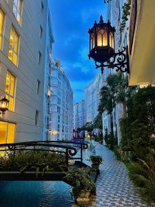 a street in a city with a bridge and buildings at City Garden Olympus condo balcony in Pattaya South