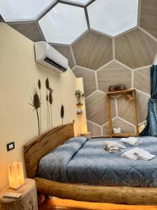 En eller flere senge i et værelse på The Land Before Time - Quad & Saddle Retreats