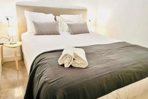 En eller flere senge i et værelse på Amanecer Urbano para 6 en Sol