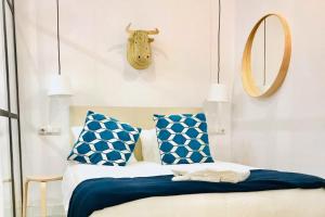 En eller flere senge i et værelse på Amanecer Urbano para 6 en Sol