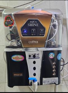 a kuna shine coffee maker on a wall at Luxurious Private Room in thane only for Male in Thane