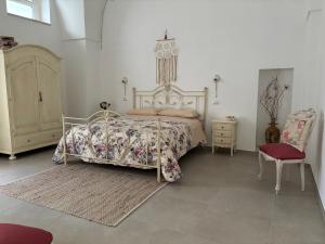 Ένα ή περισσότερα κρεβάτια σε δωμάτιο στο Nonna Maria