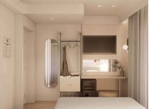 Postel nebo postele na pokoji v ubytování JB Hotel + 30 fotografií