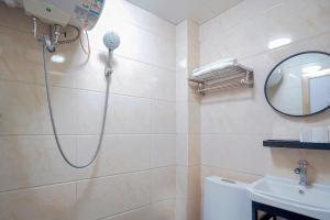 Koupelna v ubytování Duyu Hotel 都寓酒店式公寓