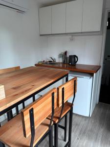 Køkken eller tekøkken på La Posada Bungalows I Simple