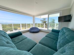 Et opholdsområde på Apê dos Sonhos - Capri Morada & Mar - Vista Mar