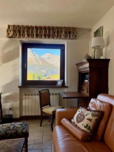 Et opholdsområde på L'Atelier du Temps - Chalet Pompon