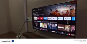 TV a/nebo společenská místnost v ubytování Prime Inn Guest House