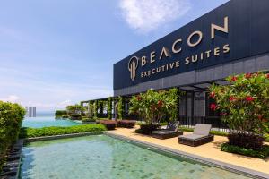 a view of the exterior of the resort with a swimming pool at Beacon Executive Suite by NGN - Georgetown Penang in George Town