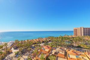 an aerial view of a resort with palm trees and the ocean at Bella Sirena Resort Premium View Condo in Puerto Peñasco