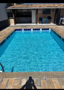 Swimmingpoolen hos eller tæt på Conforto, praticidade e bem-estar