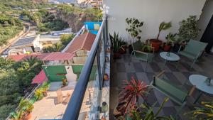 En balkon eller terrasse på Casa Jardim di Sol