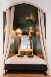 En eller flere senge i et værelse på Mourillon proche plages et port