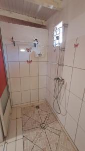 Koupelna v ubytování La Chambre d'Hôte du Bon Logis du Carbet