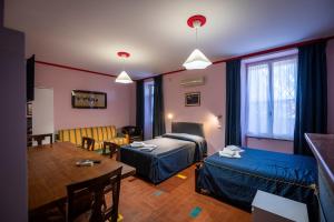 Postel nebo postele na pokoji v ubytování Residenza Arcadia