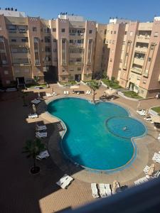 Swimmingpoolen hos eller tæt på Chez Rime Cosy apartment with pool view